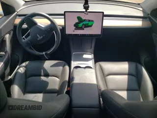 2022 Tesla Model Y Long Range with VIN 7SAYGDEE3NA007737, listed as a Copart auction lot 64602984 with 42,597 mi miles and Salvage Title. Bid and sale history available at carsss.com. Image 8.