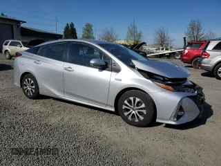 2022 Toyota Prius LE with VIN JTDKAMFPXN3200469, listed as a Copart auction lot 52983085 with 25,714 mi miles and Salvage Title. Bid and sale history available at DreamBid. Image 4.