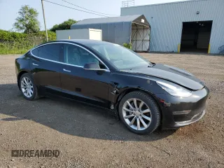 2020 Tesla Model 3 Standard Range Plus with VIN 5YJ3E1EA8LF609364, listed as a Copart auction lot 58828794 with 127,781 mi miles and Non Repairable. Bid and sale history available at DreamBid. Image 4.