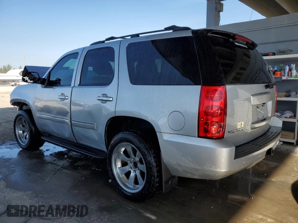 2013 GMC Yukon SLE with VIN 1GKS1AE08DR228662, listed as a Copart auction lot 83966994 with 72,007 mi miles and Salvage Title. Bid and sale history available at carsss.com. Image 2.