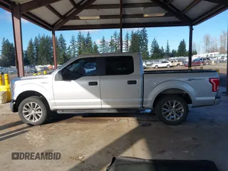 2015 Ford F-150 XLT with VIN 1FTEW1C86FKE85267, listed as a IAAI auction lot 41527996 with 119,800 mi miles and . Bid and sale history available at carsss.com. Image 14.
