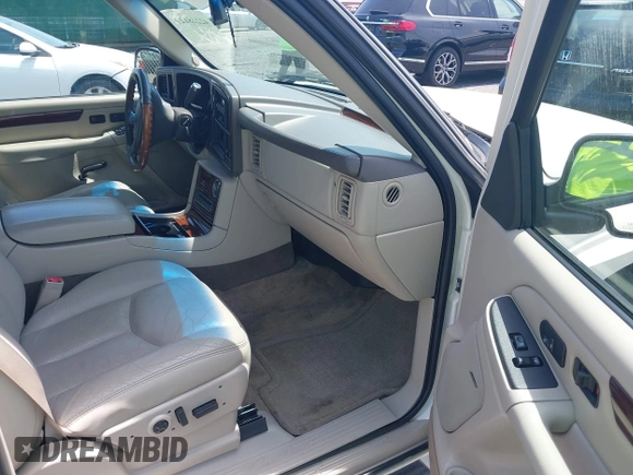 2003 Cadillac Escalade z VIN 1GYEK63N43R222254, wystawiony jako IAAI lot #42228127 z przebiegiem 167 294 mil mil oraz . Historia ofert i sprzedaży dostępna na DreamBid. Obrazek 5.