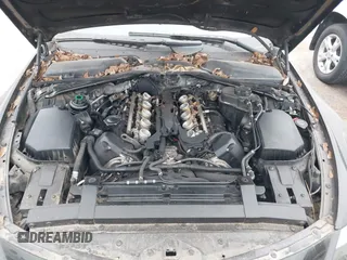 2007 BMW 6 Series M6 z VIN WBSEK93587CY78191, wystawiony jako IAAI lot #41703769 z przebiegiem Nie podano mil oraz . Historia ofert i sprzedaży dostępna na DreamBid. Obrazek 10.