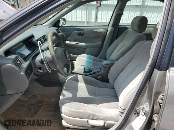 2000 Toyota Camry CE z VIN 4T1BG22K5YU013891, wystawiony jako Copart lot #56693255 z przebiegiem 248 922 mil mil oraz Szkoda całkowita • Salvage title. Historia ofert i sprzedaży dostępna na DreamBid. Obrazek 7.