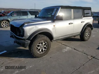 2022 Ford Bronco with VIN 1FMEE5DHXNLA86164, listed as a Copart auction lot 87763025 with 8,715 mi miles and Salvage Title. Bid and sale history available at carsss.com. Image 1.