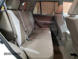 2012 Suzuki Grand Vitara Premium z VIN JS3TD0D66C4100845, wystawiony jako Copart lot #53454565 z przebiegiem 106 415 mil mil oraz Szkoda całkowita • Salvage title. Historia ofert i sprzedaży dostępna na DreamBid. Obrazek 11.