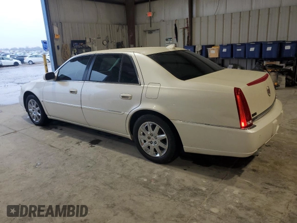 2009 Cadillac DTS 1SC z VIN 1G6KD57Y59U118737, wystawiony jako Copart lot #80776524 z przebiegiem 123 001 mil mil oraz Szkoda całkowita • Salvage title. Historia ofert i sprzedaży dostępna na DreamBid. Obrazek 2.