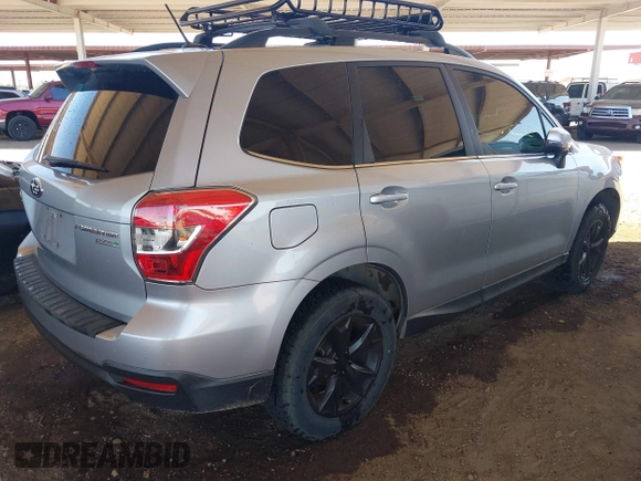 2014 Subaru Forester 2.5i Touring with VIN JF2SJAPCXEH495314, listed as a IAAI auction lot 42048073 with 156,998 mi miles. Bid and sale history available at carsss.com. Image 4.