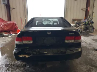 1998 Honda Civic DX with VIN 1HGEJ6127WL033124, listed as a IAAI auction lot 41635272 with 276,401 mi miles. Bid and sale history available at carsss.com. Image 16.