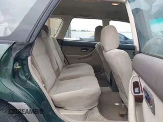 2002 Subaru Legacy Outback z VIN 4S3BH665326608814, wystawiony jako IAAI lot #41846027 z przebiegiem 210 638 mil mil oraz . Historia ofert i sprzedaży dostępna na DreamBid. Obrazek 8.