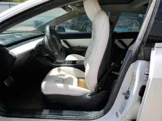 2019 Tesla Model 3 Mid Range with VIN 5YJ3E1EA3KF509087, listed as a Copart auction lot 46364865 with Not Provided miles and Salvage Title. Bid and sale history available at DreamBid. Image 7.
