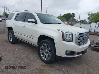 2015 GMC Yukon Denali z VIN 1GKS1CKJ3FR713531, wystawiony jako IAAI lot #41866691 z przebiegiem 157 666 mil mil oraz . Historia ofert i sprzedaży dostępna na DreamBid. Obrazek 1.