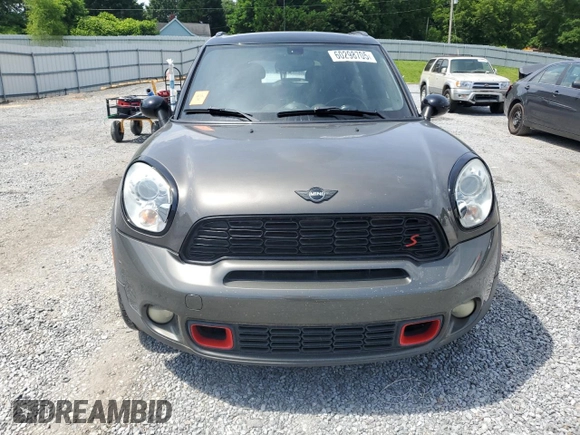 2012 MINI Countryman S with VIN WMWZC5C5XCWL56232, listed as a Copart auction lot 60298705 with 140,425 mi miles and Salvage title. Bid and sale history available at DreamBid. Image 5.