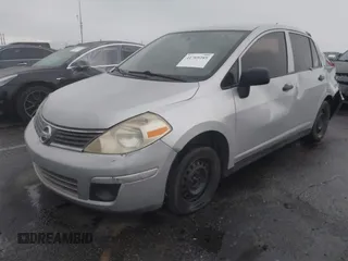 2010 Nissan Versa 1.6 with VIN 3N1CC1AP8AL393730, listed as a IAAI auction lot 41769285 with 204,981 mi miles. Bid and sale history available at carsss.com. Image 2.