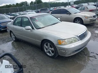1997 Acura RL w/Navigation System z VIN JH4KA9668VC010270, wystawiony jako IAAI lot #42492652 z przebiegiem Nie podano mil oraz . Historia ofert i sprzedaży dostępna na DreamBid. Obrazek 1.