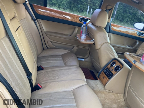 2007 Bentley Flying Spur с VIN SCBBR93W17C042658, выставлен на аукционе Copart как лот 62427535 с пробегом 97 393 миль миль и Списание • Salvage title. История ставок и продаж доступна на DreamBid. Изображение 6.