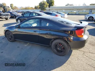2000 Toyota Celica GT with VIN JTDDR32TXY0022339, listed as a Copart auction lot 79016024 with 161,429 mi miles and Salvage Title. Bid and sale history available at carsss.com. Image 2.
