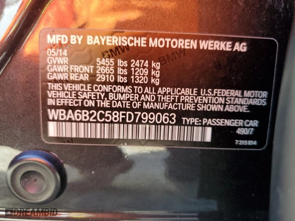 2015 BMW 6 Series 650i with VIN WBA6B2C58FD799063, listed as a Copart auction lot 77819914 with 0 mi miles and Salvage Title. Bid and sale history available at carsss.com. Image 13.