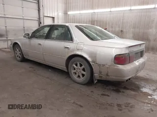2003 Cadillac Seville Luxury SLS z VIN 1G6KS54Y93U200813, wystawiony jako IAAI lot #41544661 z przebiegiem 159 550 mil mil oraz . Historia ofert i sprzedaży dostępna na DreamBid. Obrazek 3.