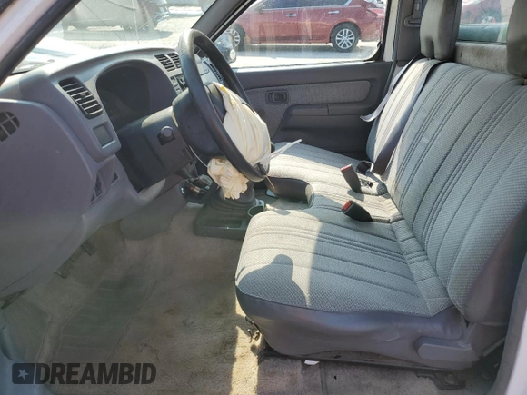 1998 Nissan Frontier XE with VIN 1N6DD21S8WC386978, listed as a Copart auction lot 58776015 with Not provided miles and Clean title. Bid and sale history available at DreamBid. Image 7.