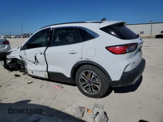 2021 Ford Escape SEL Hybrid z VIN 1FMCU0CZ5MUA52570, wystawiony jako Copart lot #42097635 z przebiegiem 105 059 mil mil oraz Czysty tytuł • Clean title. Historia ofert i sprzedaży dostępna na DreamBid. Obrazek 2.
