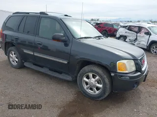 2003 GMC Envoy SLT with VIN 1GKDT13S632197541, listed as a IAAI auction lot 42178695 with 221,189 mi miles and . Bid and sale history available at DreamBid. Image 1.