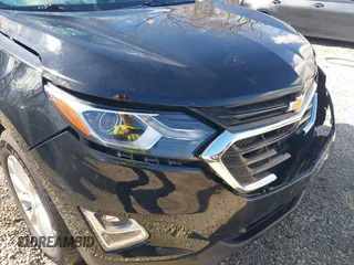 2021 Chevrolet Equinox LT z VIN 2GNAXKEV8M6126322, wystawiony jako IAAI lot #41879017 z przebiegiem 116 489 mil mil oraz . Historia ofert i sprzedaży dostępna na DreamBid. Obrazek 18.