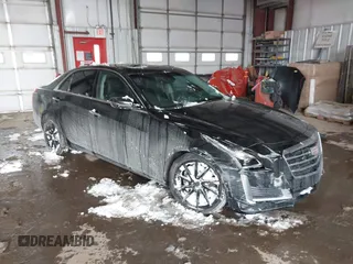 2016 Cadillac CTS Luxury Collection AWD z VIN 1G6AX5SX6G0111768, wystawiony jako IAAI lot #41563991 z przebiegiem 76 718 mil mil oraz . Historia ofert i sprzedaży dostępna na DreamBid. Obrazek 1.