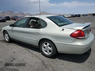 2007 Ford Taurus SE with VIN 1FAFP53U27A156844, listed as a Copart auction lot 59204695 with 157,633 mi miles and Salvage title. Bid and sale history available at DreamBid. Image 2.