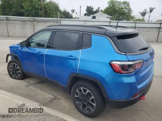 2021 Jeep Compass Trailhawk z VIN 3C4NJDDB9MT556516, wystawiony jako Copart lot #60338575 z przebiegiem 86 978 mil mil oraz Czysty tytuł • Clean title. Historia ofert i sprzedaży dostępna na DreamBid. Obrazek 2.