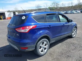 2013 Ford Escape SE with VIN 1FMCU9G95DUA76544, listed as a IAAI auction lot 42080309 with 167,821 mi miles and . Bid and sale history available at DreamBid. Image 4.