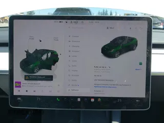 2022 Tesla Model Y Long Range z VIN 7SAYGDEE7NF418223, wystawiony jako IAAI lot #42046651 z przebiegiem 18 724 mil mil oraz . Historia ofert i sprzedaży dostępna na DreamBid. Obrazek 19.
