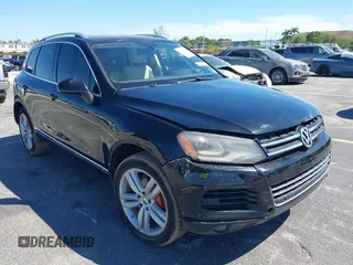 2013 Volkswagen Touareg Lux with VIN WVGEF9BP6DD004454, listed as a IAAI auction lot 41862958 with 239,548 mi miles and . Bid and sale history available at DreamBid. Image 6.
