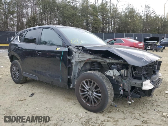 2020 Mazda CX-5 Touring with VIN JM3KFACM1L0767976, listed as a Copart auction lot 46299715 with 148,137 mi miles and Salvage Title. Bid and sale history available at carsss.com. Image 4.