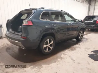 2020 Jeep Cherokee Limited with VIN 1C4PJMDX2LD516951, listed as a IAAI auction lot 41272629 with 99,717 mi miles and . Bid and sale history available at DreamBid. Image 4.