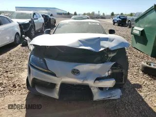 2021 Toyota GR Supra 3.0 with VIN WZ1DB0C02MW041211, listed as a Copart auction lot 79557064 with 0 mi miles and Salvage Title. Bid and sale history available at carsss.com. Image 5.
