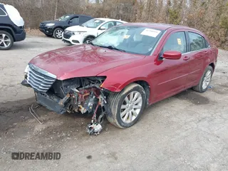 2012 Chrysler 200 Touring with VIN 1C3CCBBB6CN203453, listed as a IAAI auction lot 41708919 with 199,204 mi miles. Bid and sale history available at carsss.com. Image 2.