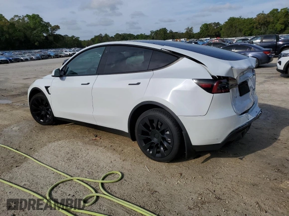 2022 Tesla Model Y Long Range with VIN 7SAYGDEE4NF398710, listed as a Copart auction lot 50510375 with 46,430 mi miles and Non Repairable. Bid and sale history available at DreamBid. Image 2.