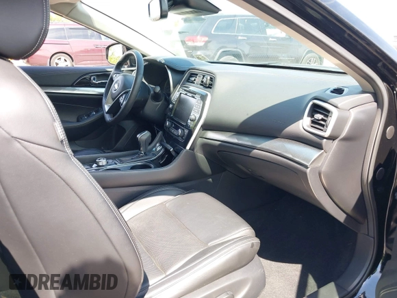 2020 Nissan Maxima SL with VIN 1N4AA6DV5LC366300, listed as a IAAI auction lot 42220939 with 16,858 mi miles and . Bid and sale history available at DreamBid. Image 5.