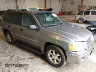 2006 GMC Envoy SLE with VIN 1GKDT13S762250462, listed as a IAAI auction lot 42521572 with 282,232 mi miles and . Bid and sale history available at DreamBid. Image 1.