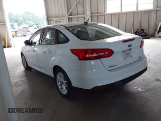 2016 Ford Focus SE with VIN 1FADP3F26GL247657, listed as a IAAI auction lot 42590097 with 37,851 mi miles and . Bid and sale history available at DreamBid. Image 3.