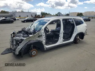 2018 Honda Pilot Touring z VIN 5FNYF6H97JB006159, wystawiony jako Copart lot #56760025 z przebiegiem 50 323 mil mil oraz Szkoda całkowita • Salvage title. Historia ofert i sprzedaży dostępna na DreamBid. Obrazek 1.