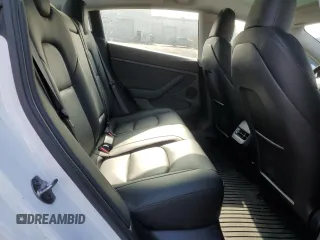 2023 Tesla Model 3 с VIN 5YJ3E1EA0PF647709, выставлен на аукционе Copart как лот 60292385 с пробегом 26 943 миль миль и Списание • Salvage title. История ставок и продаж доступна на DreamBid. Изображение 10.