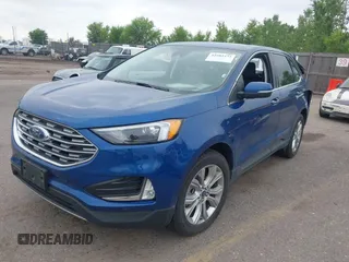 2022 Ford Edge Titanium with VIN 2FMPK4K95NBB05789, listed as a IAAI auction lot 42582372 with 58,379 mi miles and . Bid and sale history available at DreamBid. Image 2.