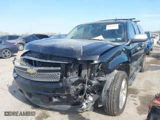 2011 Chevrolet Suburban LTZ with VIN 1GNSCKE03BR117338, listed as a IAAI auction lot 41878479 with 182,327 mi miles. Bid and sale history available at carsss.com. Image 16.