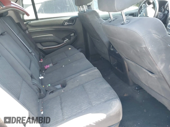 2017 Chevrolet Tahoe LS with VIN 1GNSCAKC3HR328833, listed as a IAAI auction lot 41993364 with 124,817 mi miles and . Bid and sale history available at DreamBid. Image 8.