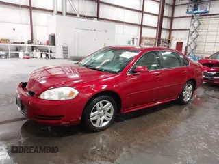 2013 Chevrolet Impala LT with VIN 2G1WG5E30D1258088, listed as a IAAI auction lot 42088699 with 145,416 mi miles and . Bid and sale history available at DreamBid. Image 2.