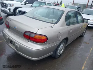 1998 Chevrolet Malibu LS with VIN 1G1NE52M1W6249023, listed as a IAAI auction lot 41779319 with 71,307 mi miles. Bid and sale history available at carsss.com. Image 4.