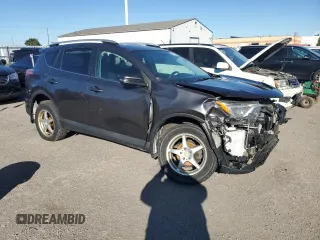 2016 Toyota RAV4 LE with VIN 2T3ZFREV3GW269727, listed as a Copart auction lot 74796814 with 235,242 mi miles and Salvage Title. Bid and sale history available at DreamBid. Image 4.