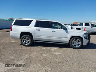 2017 Chevrolet Suburban Premier z VIN 1GNSCJKC7HR142082, wystawiony jako IAAI lot #41749026 z przebiegiem 152 415 mil mil oraz . Historia ofert i sprzedaży dostępna na DreamBid. Obrazek 13.